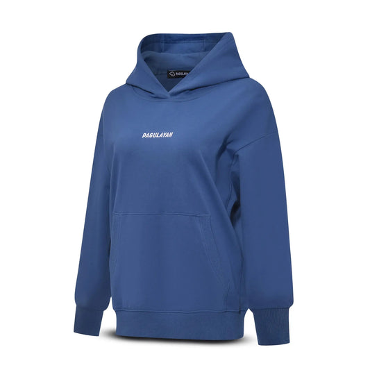 Angled view of the Pagulayan Women’s Drop-Shoulder Pocket Hoodie in blue showing the front logo and relaxed fit.