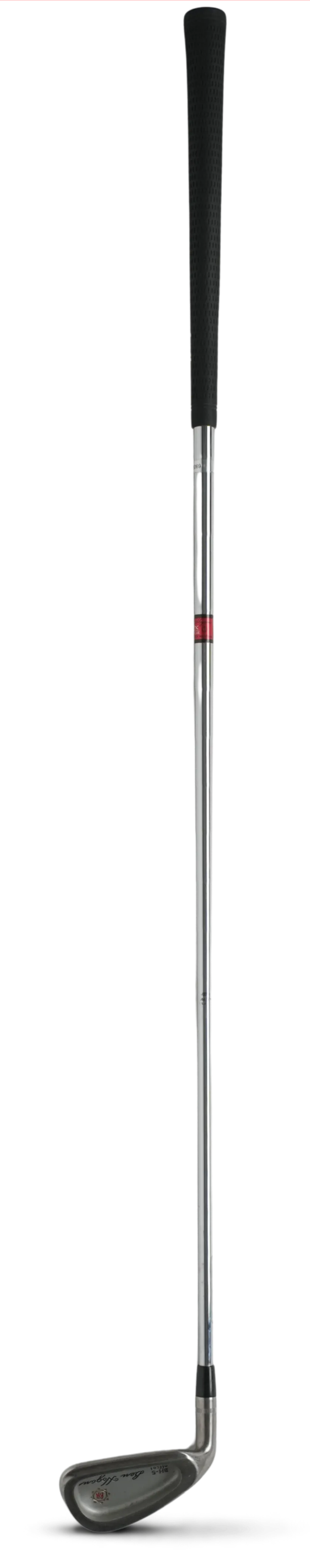 A single golf iron club shown vertically against a plain white background, with a thin red rectangular outline around the full club. The club has a black grip, a long silver shaft with a small red accent near the upper middle, and a dark gray metal head.