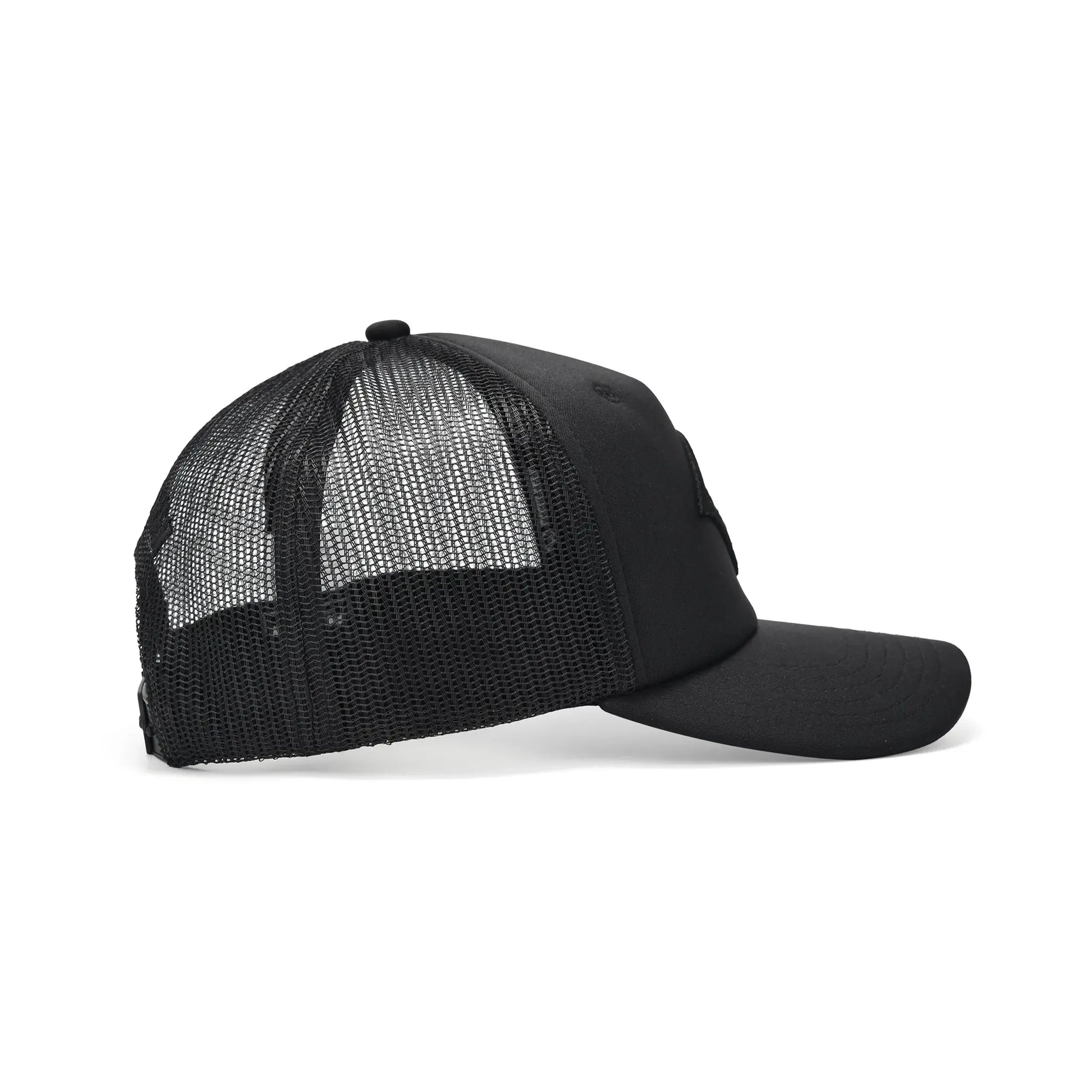 Side view of Lion Head Blackout Cap showing breathable mesh panels and curved bill on black 5 panel trucker cap.