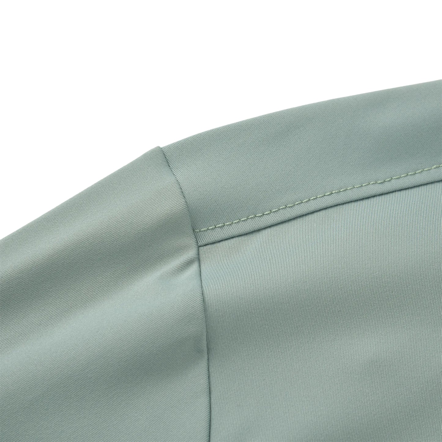 The image shows the stitched shoulder seam of the Team Ontario billiards jersey in light sage green fabric.