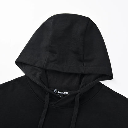 Close-up of the Blackout Hoodie hood showing the smooth black fabric and inner Pagulayan label.