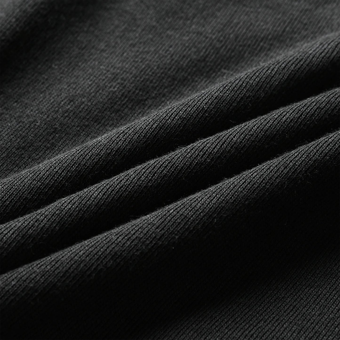 Close-up of black 100% cotton fabric used for Pagulayan Cues boxer briefs showing soft and breathable texture.