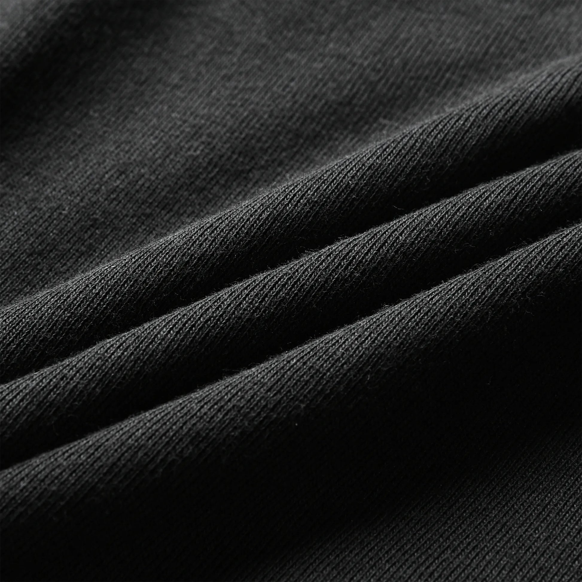 Close-up of black 100% cotton fabric used for Pagulayan Cues boxer briefs showing soft and breathable texture.