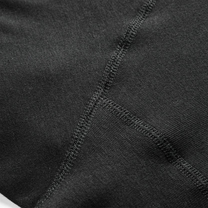Close-up of black 100% cotton boxer briefs inner seam showing smooth stitching designed to reduce chafing.