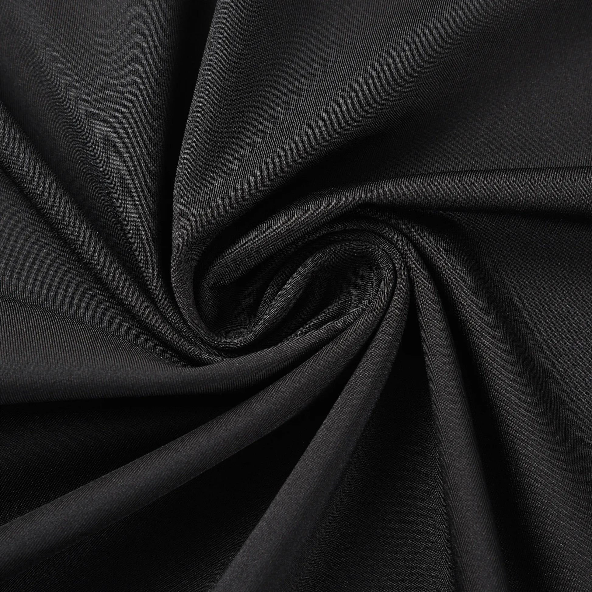 Close-up view of the Pagulayan Jersey fabric showing smooth, stretchable black material used for comfort and performance.