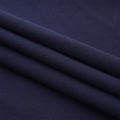 Close-up of navy cotton pique fabric used in the Pagulayan Just Right polo shirt, breathable and comfortable material.