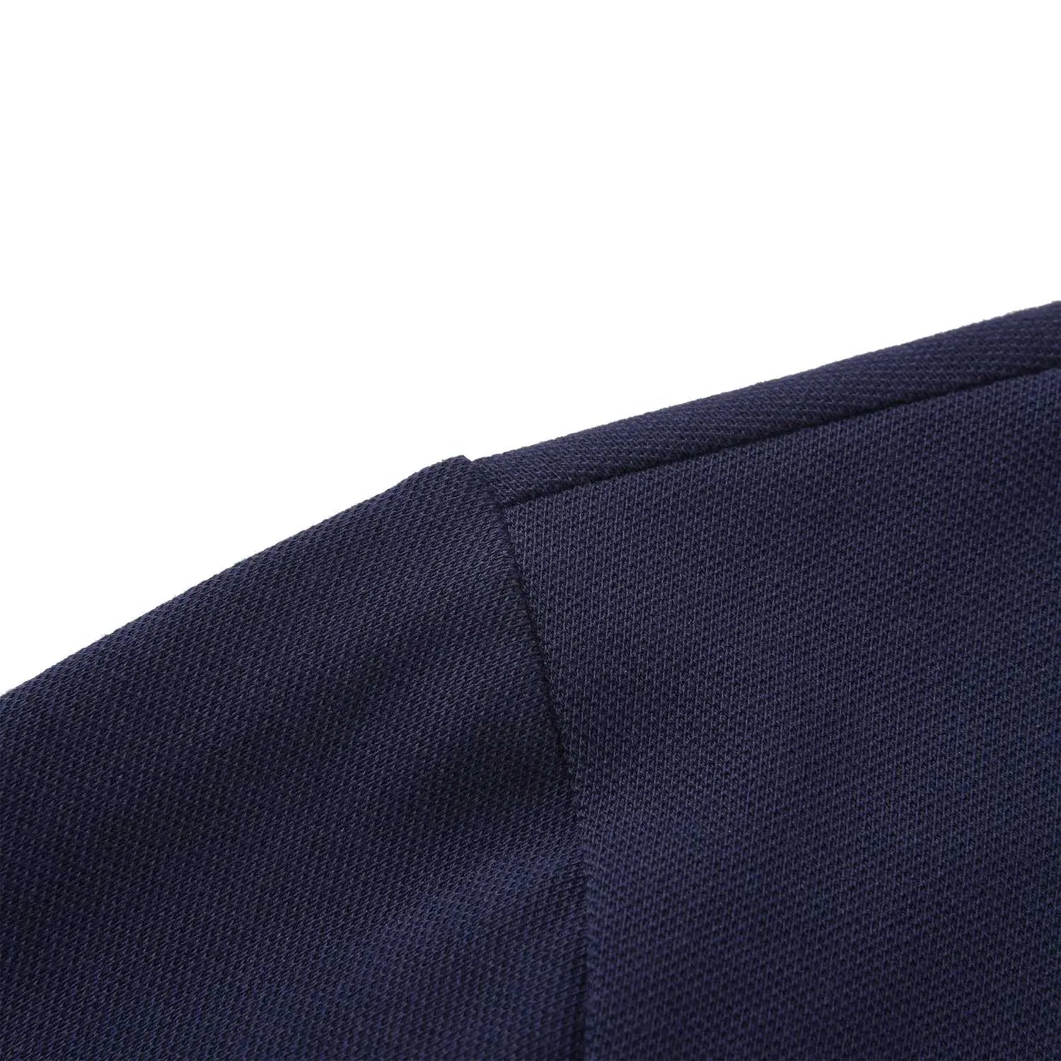 Close-up of shoulder seam on Pagulayan Just Right navy cotton pique polo shirt showing durable stitching.