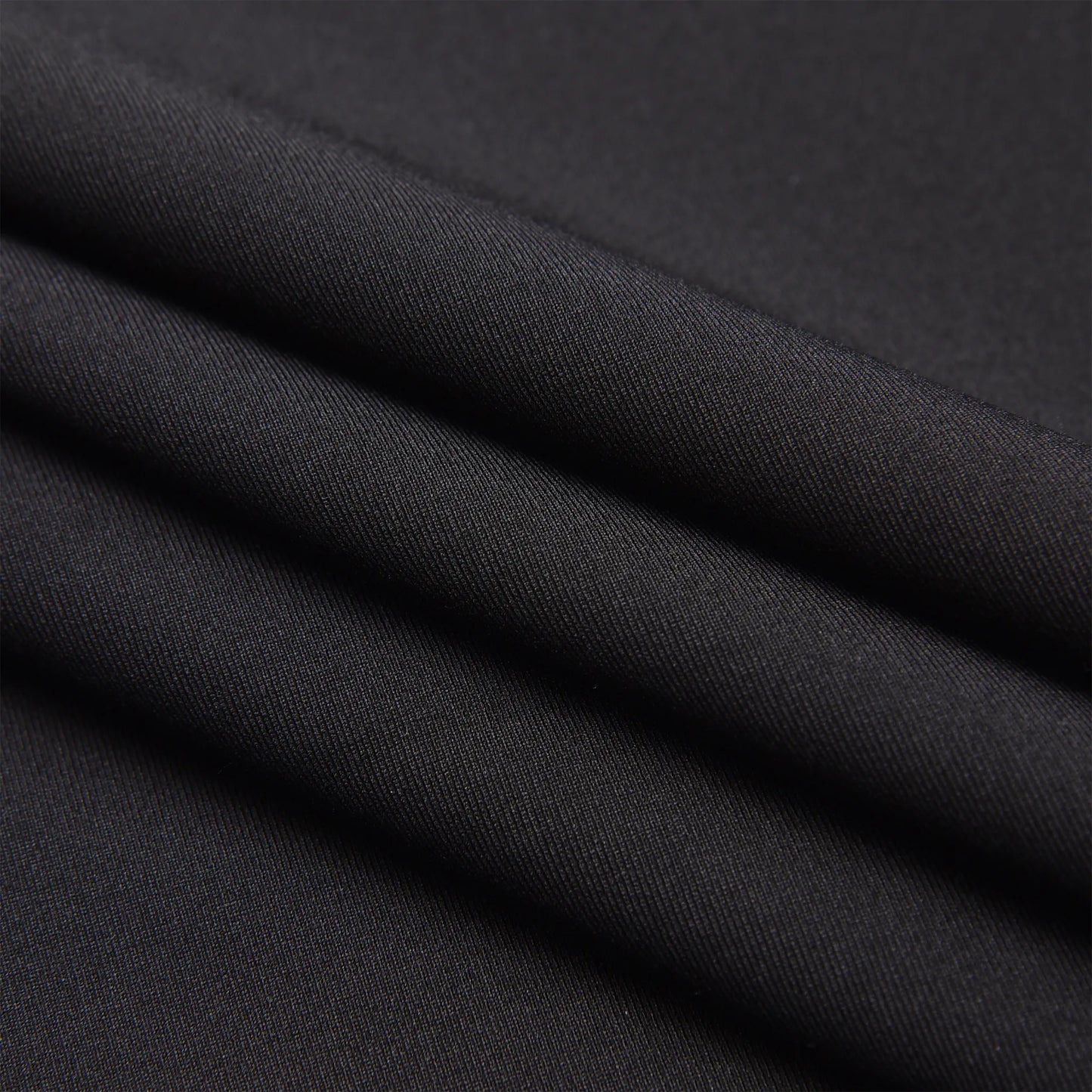Fabric fold close-up showing the texture and material of the Pagulayan Men’s Team Canada billiards jersey.