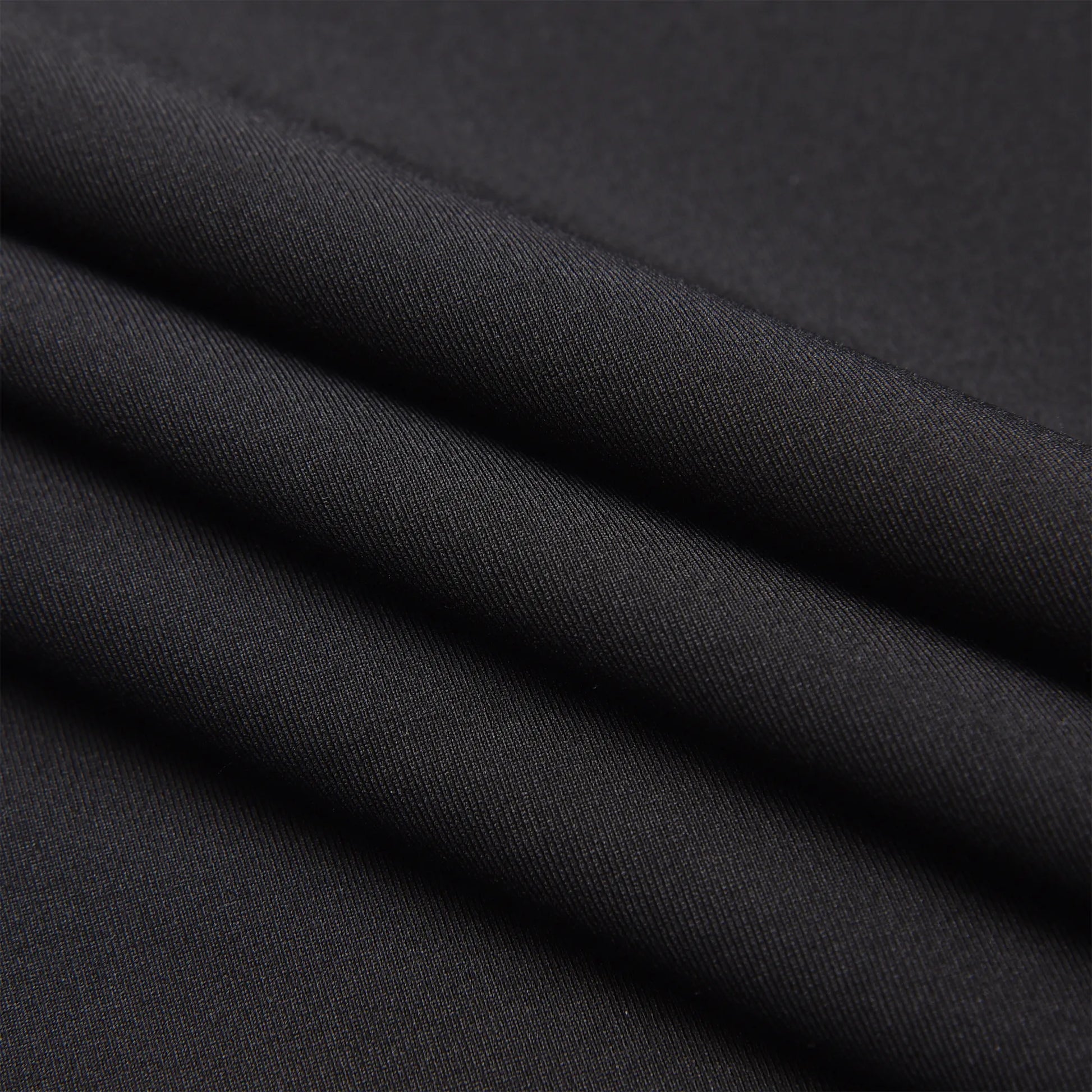Fabric fold close-up showing the texture and material of the Pagulayan Men’s Team Canada billiards jersey.