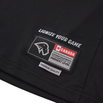 Patch detail on the Pagulayan Men’s Team Canada billiards jersey showing the Canada label and Lionize Your Game text.