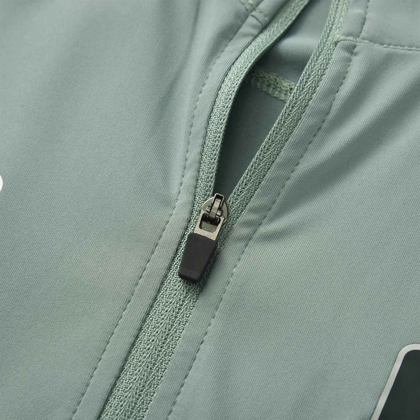 Close-up of the Team Ontario Pagulayan billiards jersey zipper showing the smooth stitching and durable front zip design.