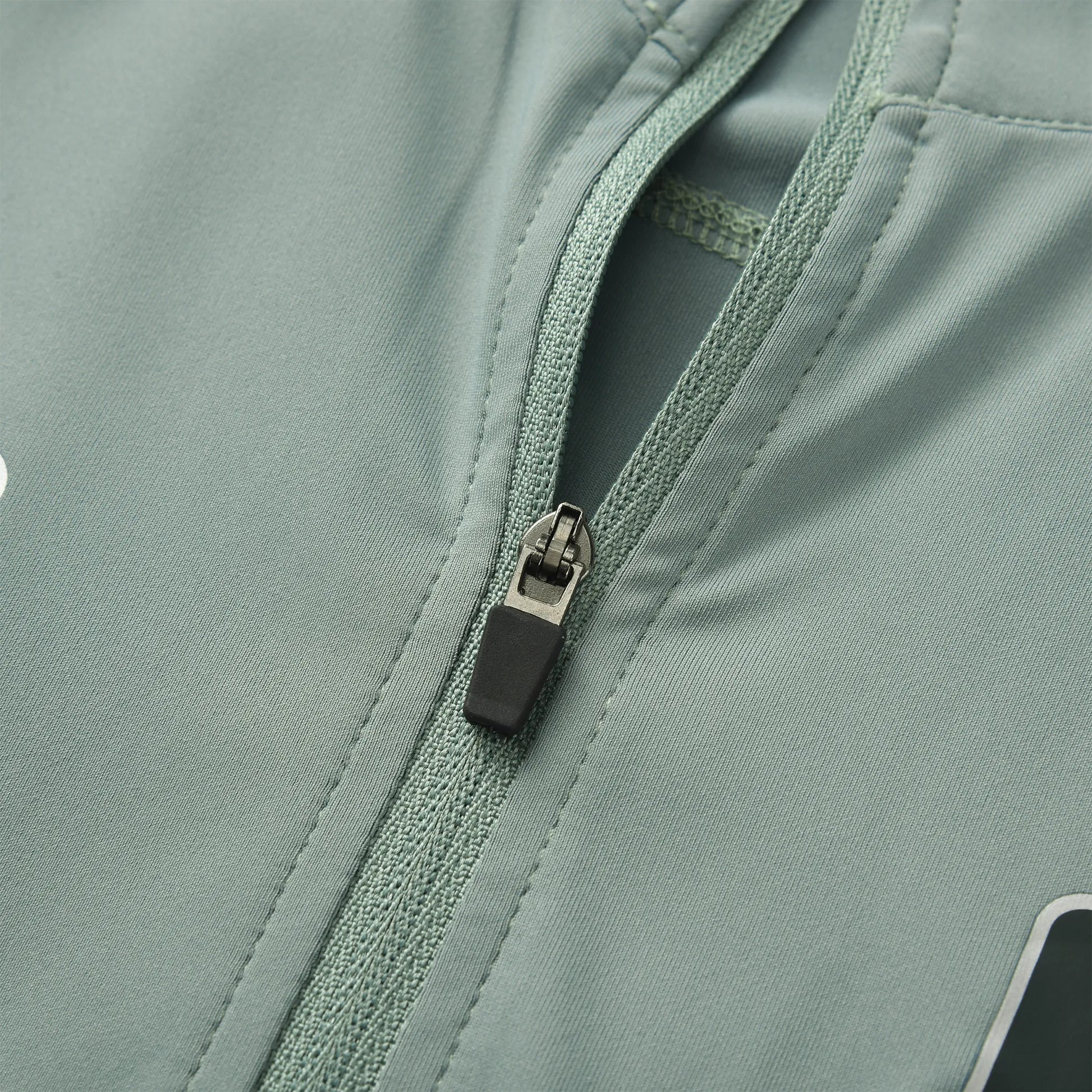 Close-up of the Team Ontario Pagulayan billiards jersey zipper showing the smooth stitching and durable front zip design.