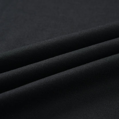 Close-up of the black fabric texture and material of the Pagulayan PAGS Shirt.