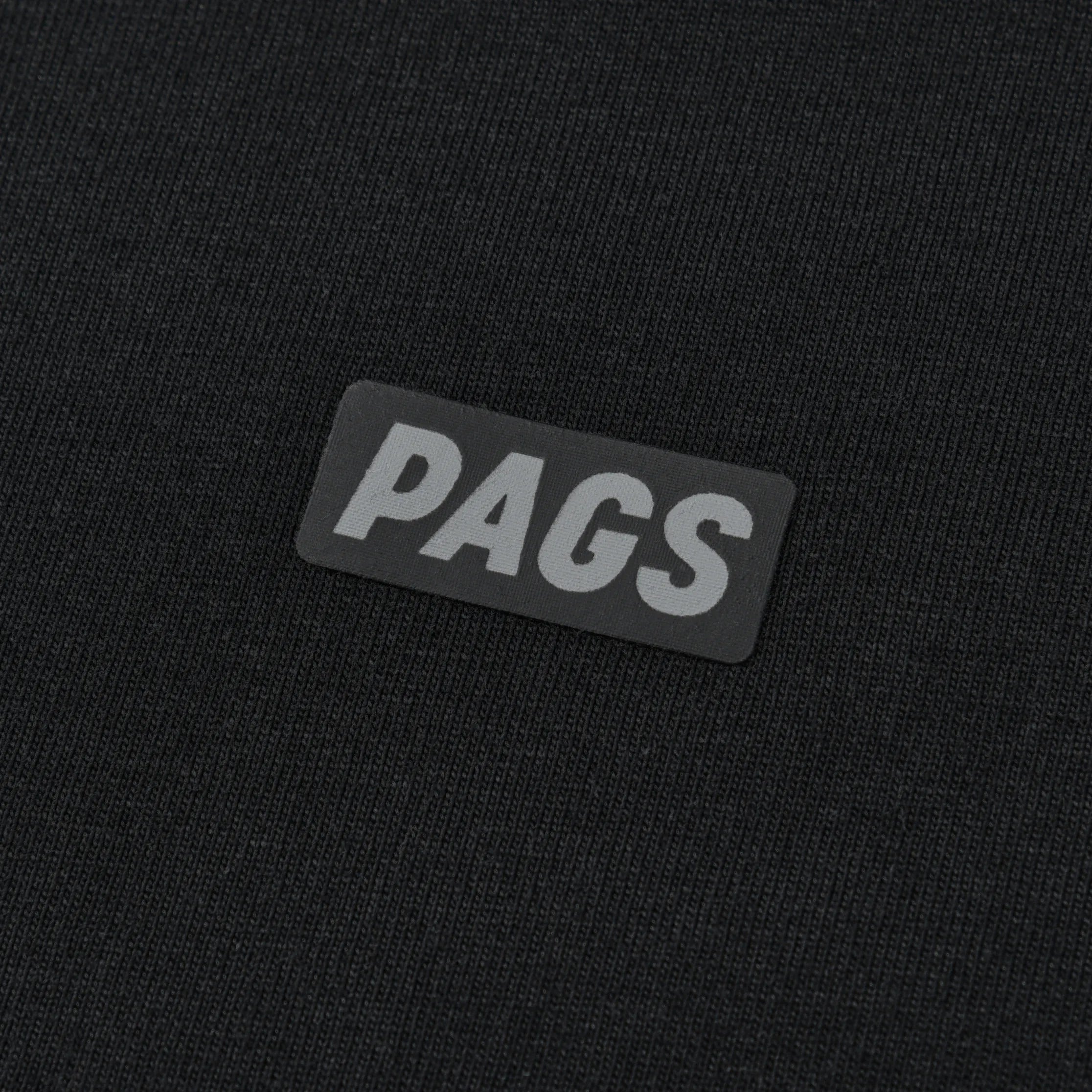 Close-up of the PAGS logo detail on the black Pagulayan PAGS Shirt.