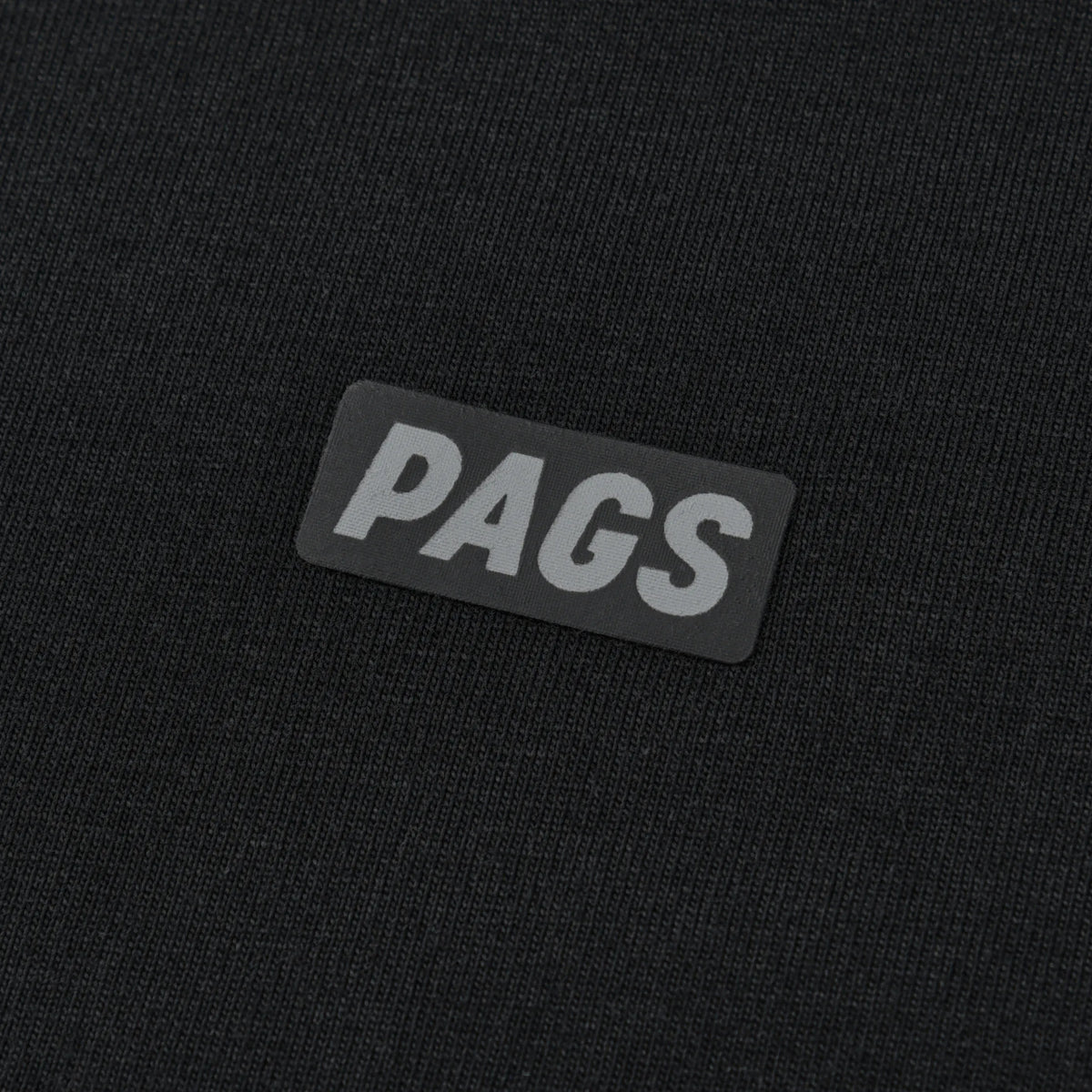 Close-up of the PAGS logo detail on the black Pagulayan PAGS Shirt.