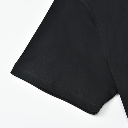 Close-up of the black Pagulayan PAGS Shirt sleeve with finished hem stitching.