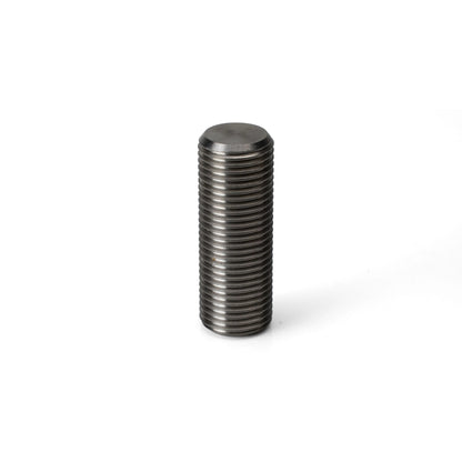 Largest Pagulayan Precision cue weight bolt from the eight-piece kit for adjusting overall pool cue weight.