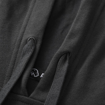 Close up of the Pagulayan Puff Logo Hoodie drawstrings showing the textured cords and inner label detail.