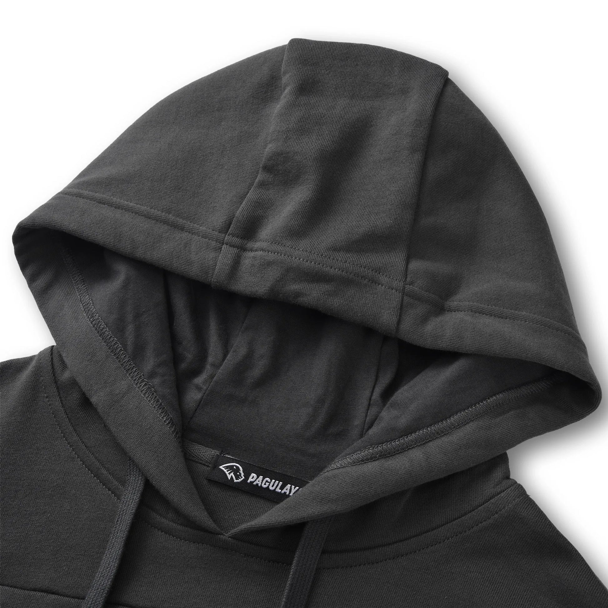 Close up of the Pagulayan Puff Logo Hoodie hood showing its stitching, inner label, and smooth fabric finish.