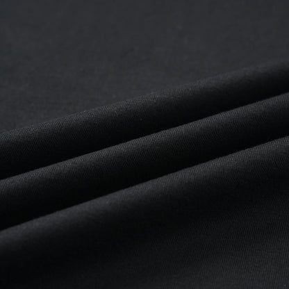 Close-up of the black fabric texture and material of the Small Pagulayan Logo Shirt.