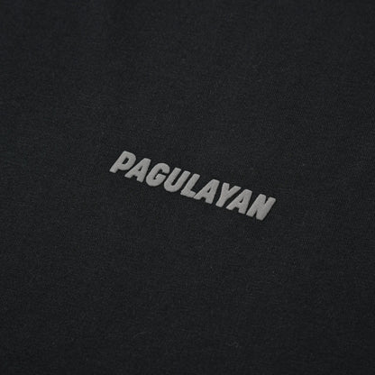 Close-up of the small Pagulayan chest logo on the black Small Pagulayan Logo Shirt.