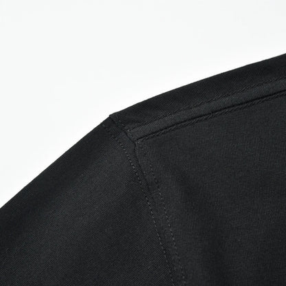 Close-up of the black Small Pagulayan Logo Shirt shoulder seam and stitching.