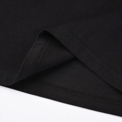Close up of hem stitching and fabric detail on Pagulayan Stealth Logo black cotton t shirt.