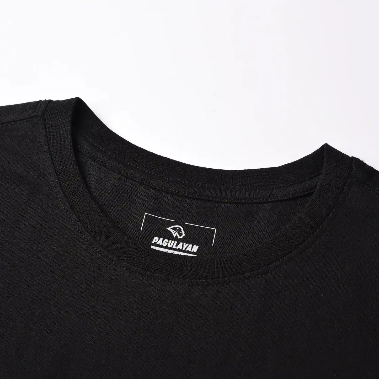 Close up of Pagulayan Stealth Logo black cotton t shirt ribbed crewneck collar and tagless label.