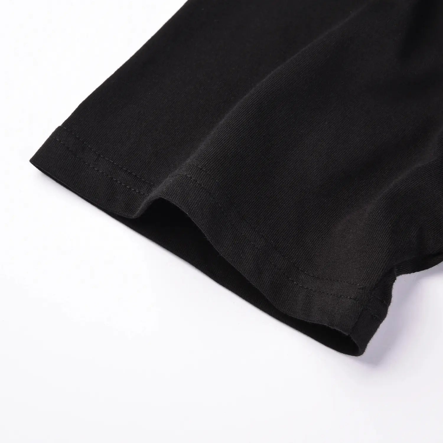 Close up of sleeve stitching on Pagulayan Stealth Logo black cotton t shirt.