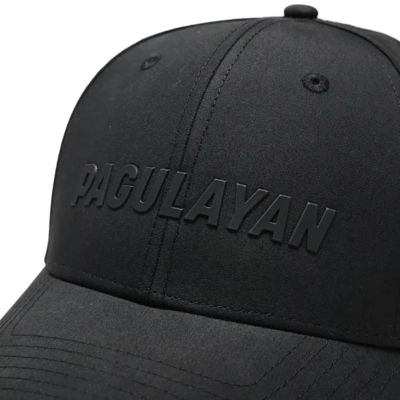 Close-up of Pagulayan Stealth Logo black snapback cap showing raised stealth Pagulayan logo on structured front panel.