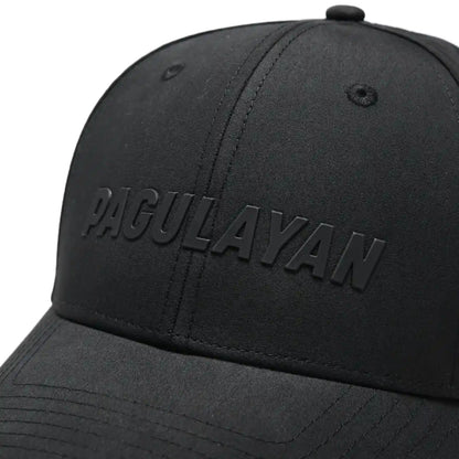 Close-up of Pagulayan Stealth Logo black snapback cap showing raised stealth Pagulayan logo on structured front panel.