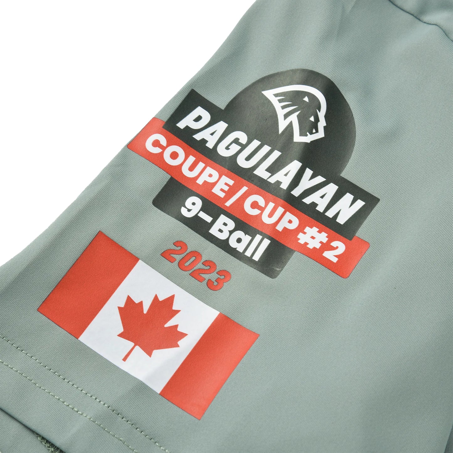 A close-up of the Pagulayan Cup #2 9-Ball 2023 sleeve patch with Canada flag on the Team Ontario Billiards Jersey.