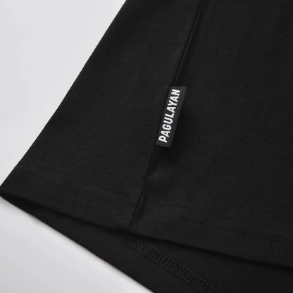 Pagulayan brand tag detail on The Subtle T-Shirt minimalist black cotton t shirt.