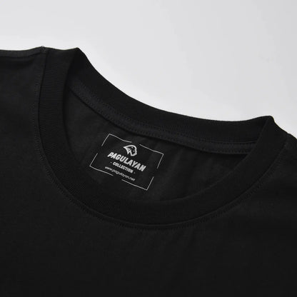 Ribbed crewneck collar and heat pressed Pagulayan label on The Subtle T-Shirt black cotton t shirt.