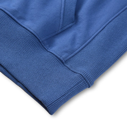 Close up of the Pagulayan Women’s Drop-Shoulder Pocket Hoodie hem showing the ribbed band and stitching detail.