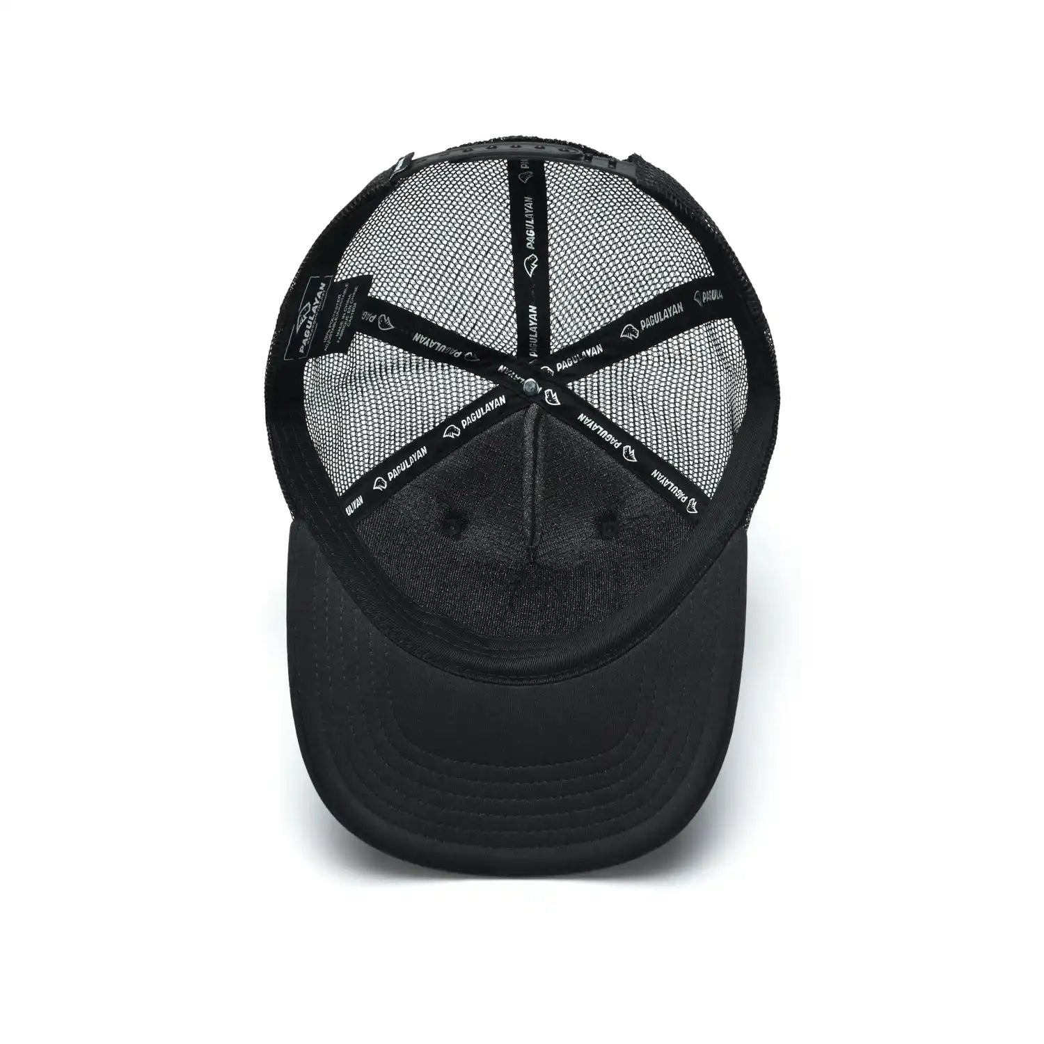 Interior view of Pagulayan black trucker cap showing 6 panel structure, mesh lining, and adjustable snapback closure.