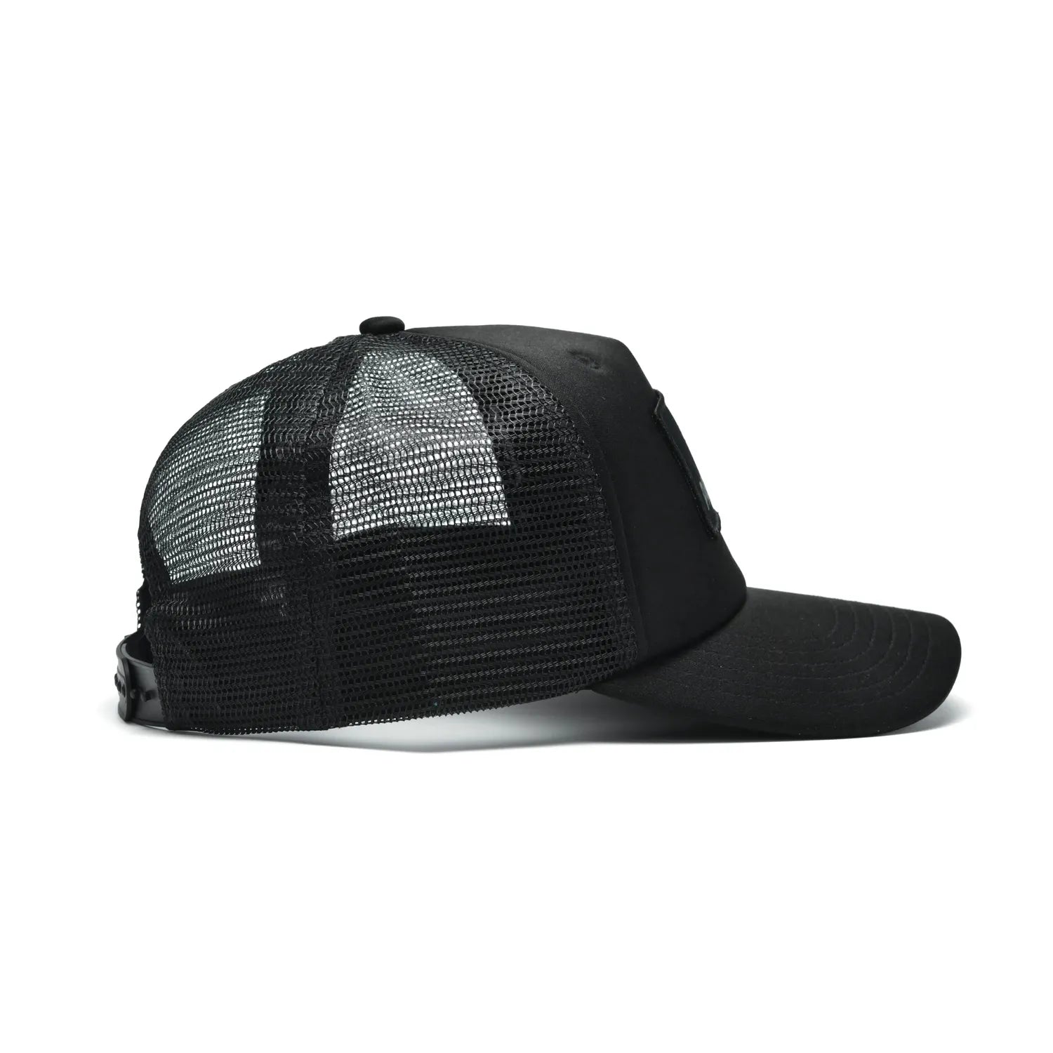 Pagulayan black 6 panel trucker cap side view showing breathable mesh panels and curved bill.