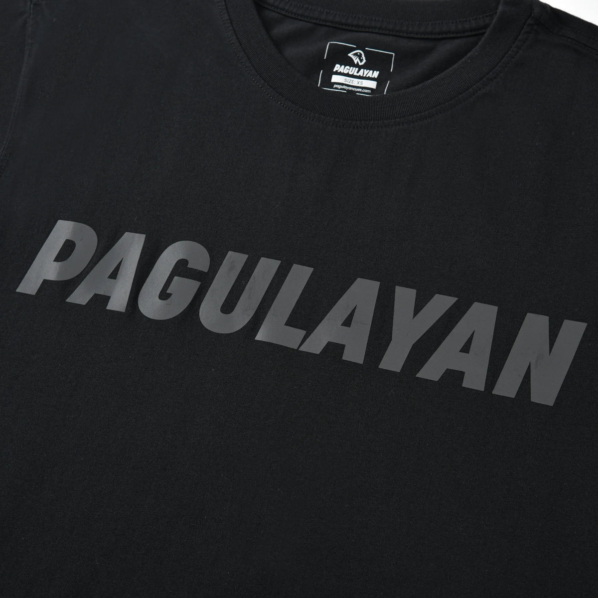Close-up of the tonal Pagulayan chest logo on the black Stealth Pagulayan Logo Long Sleeve Shirt.