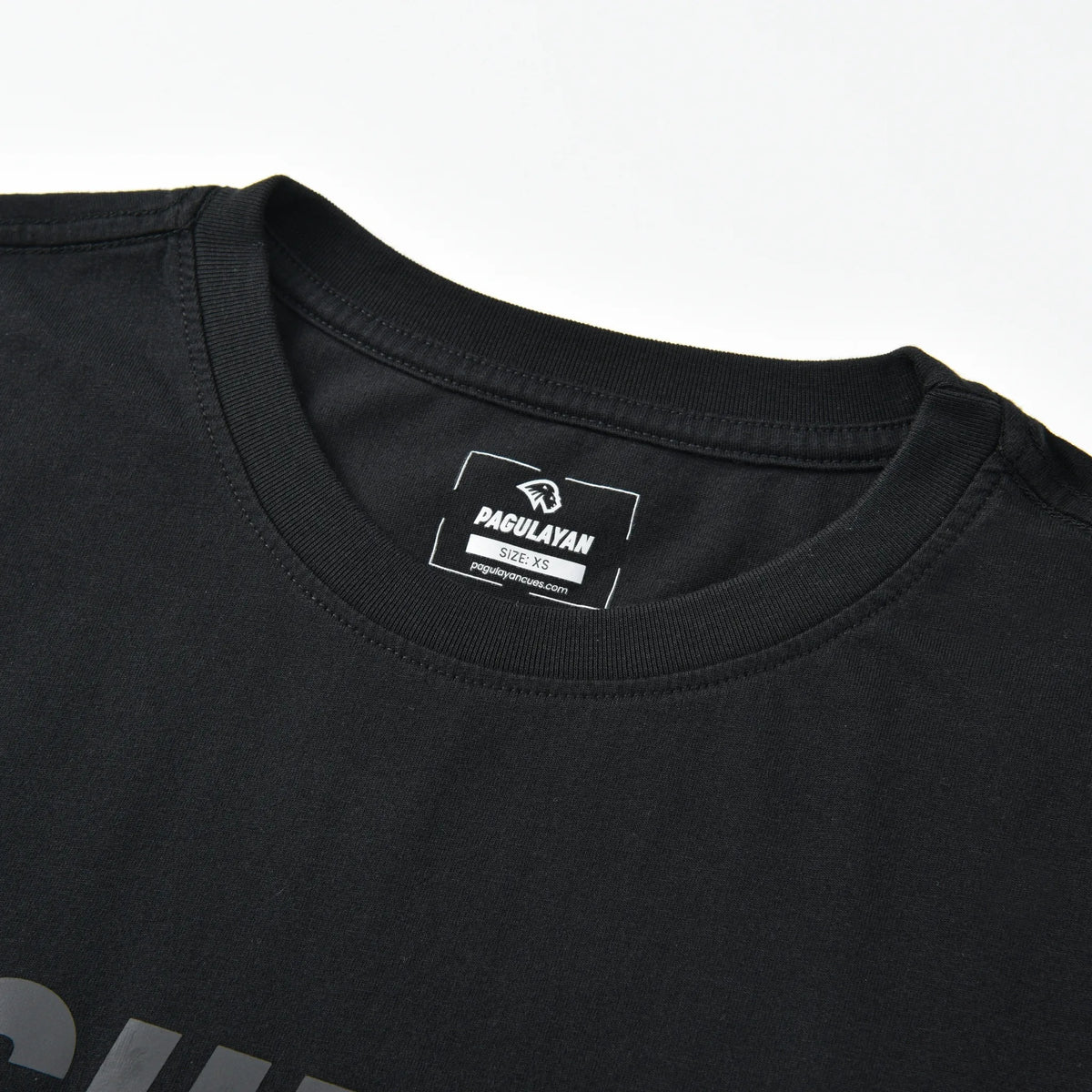 Close-up of the crew neck collar and printed Pagulayan label on the Stealth Pagulayan Logo Long Sleeve Shirt.