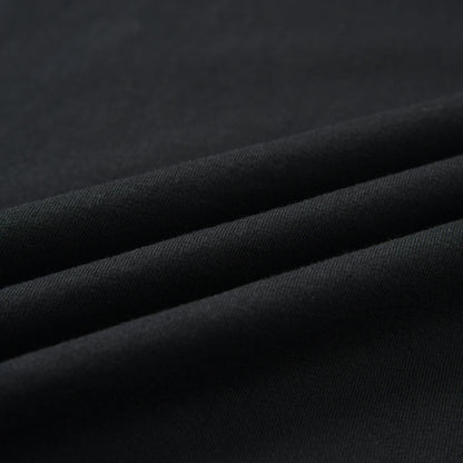 Close-up of the black fabric texture of the Stealth Pagulayan Logo Long Sleeve Shirt.