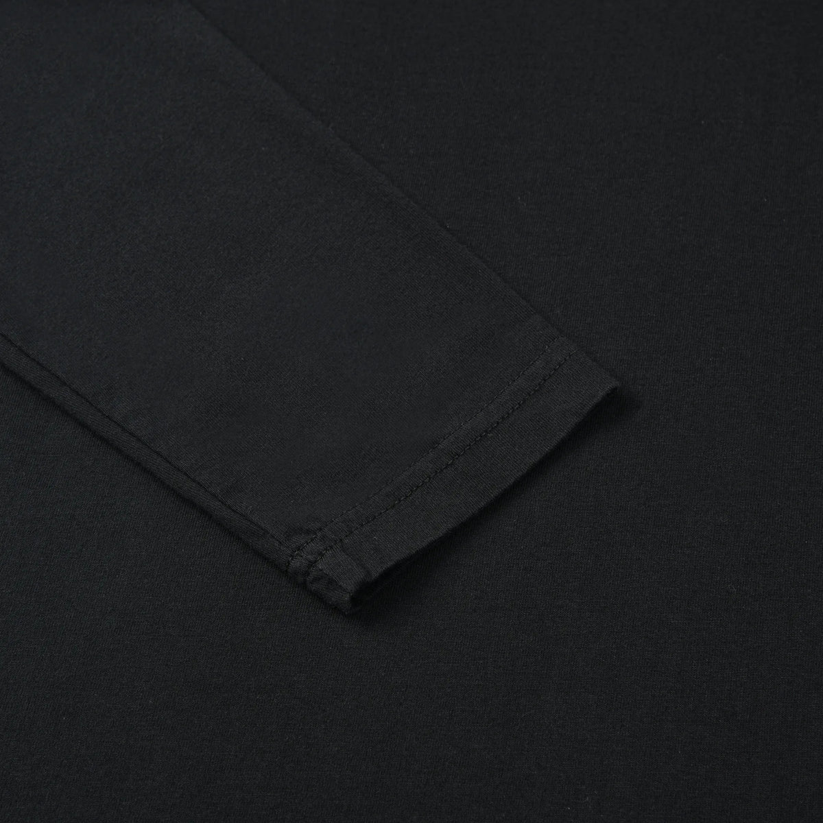 Close-up of the sleeve cuff and stitching on the Stealth Pagulayan Logo Long Sleeve Shirt.