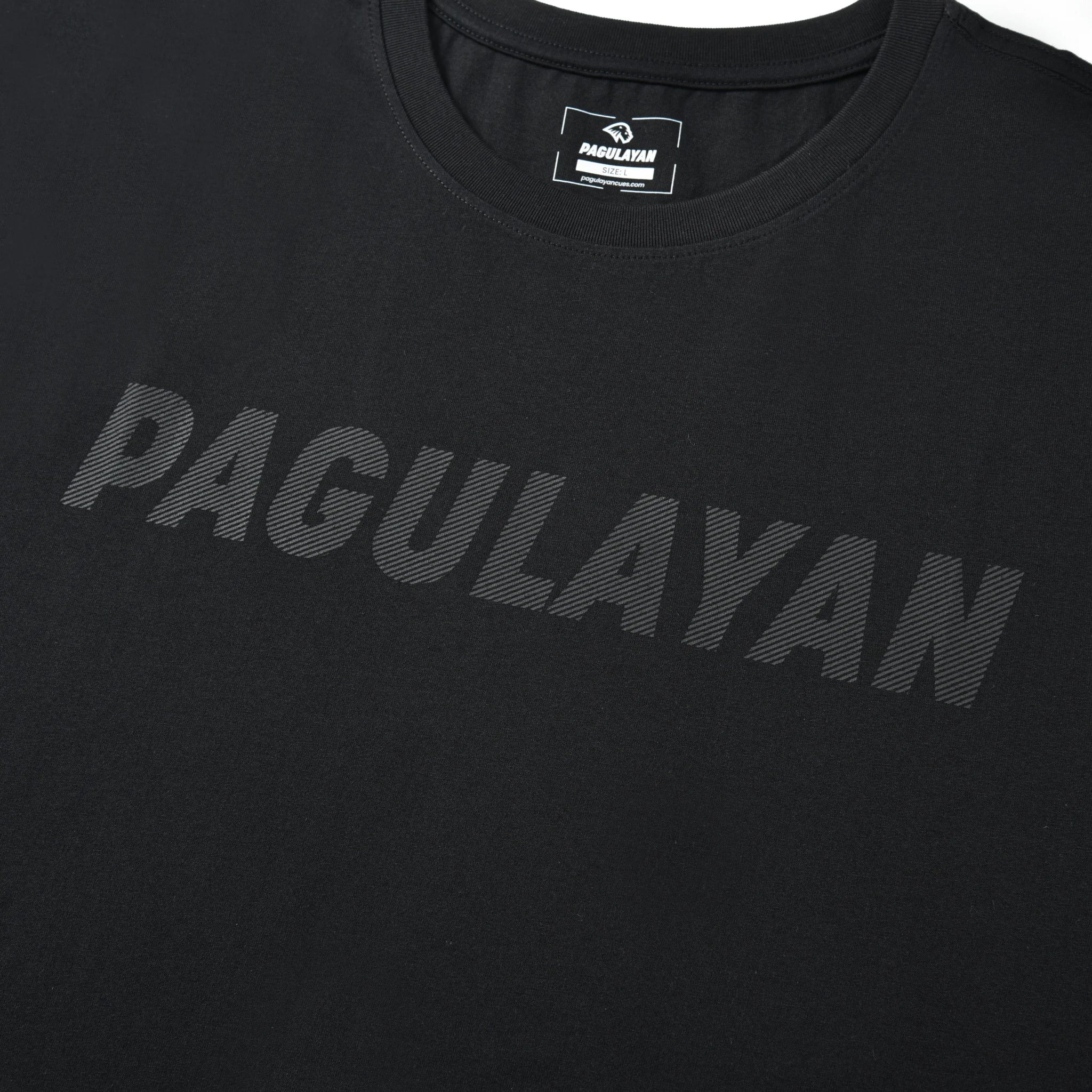 Close-up of the striped Pagulayan chest logo on the black Stripe Pagulayan Logo Shirt.