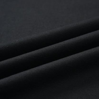 Close-up of the black fabric texture on the Stripe Pagulayan Logo Shirt.