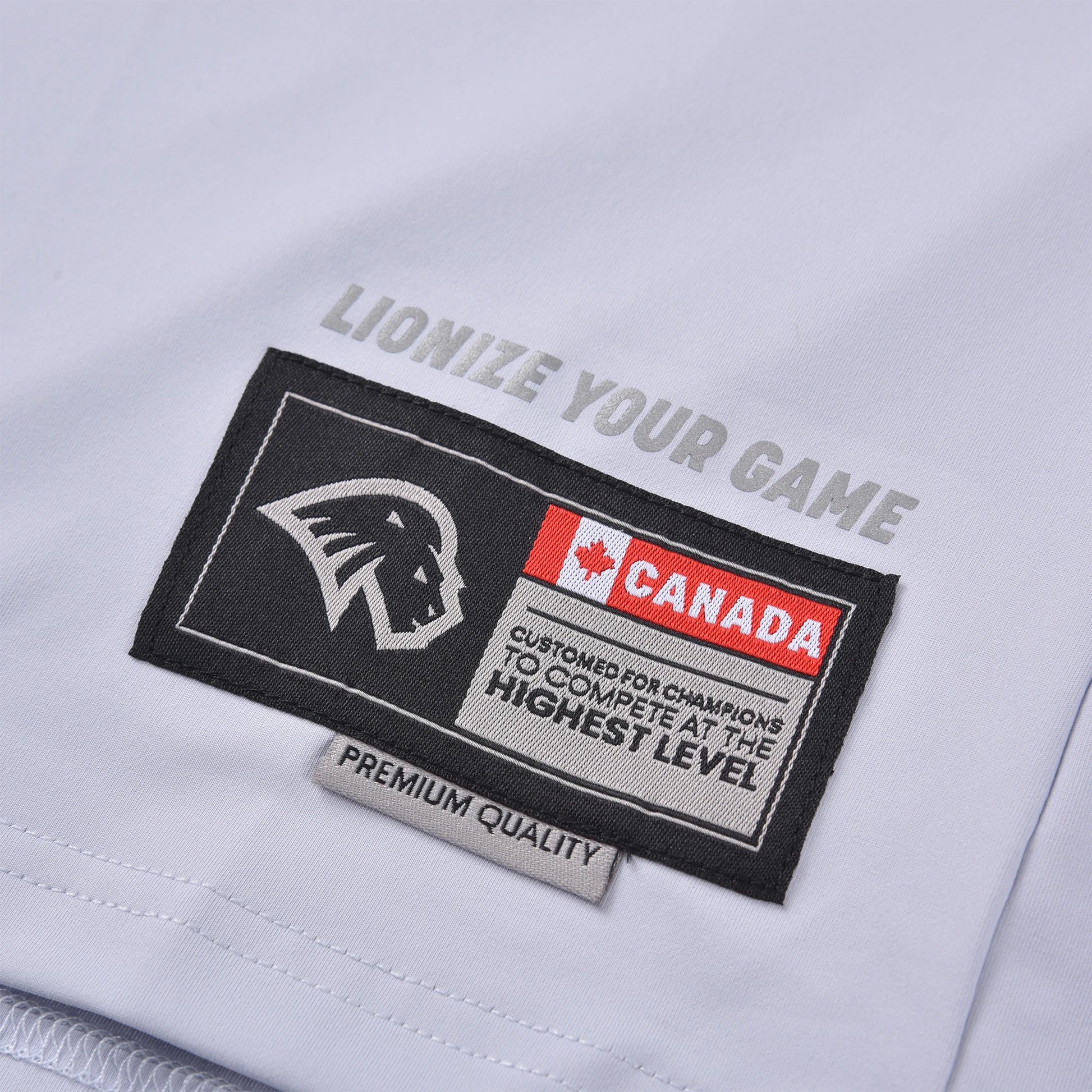 Close-up of the Pagulayan Team Québec billiards jersey showing the Lionize Your Game print and Canada premium quality patch.